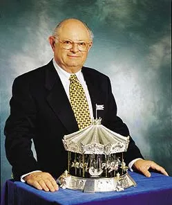 George Rotenstein with one of his sterling-silver musical carousels